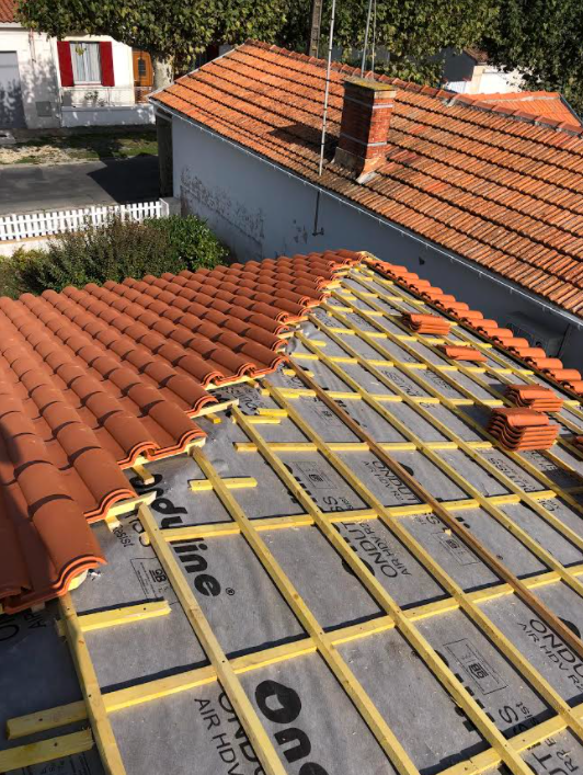 Travaux de couverture d'une toiture suite dégât et usure du toit 